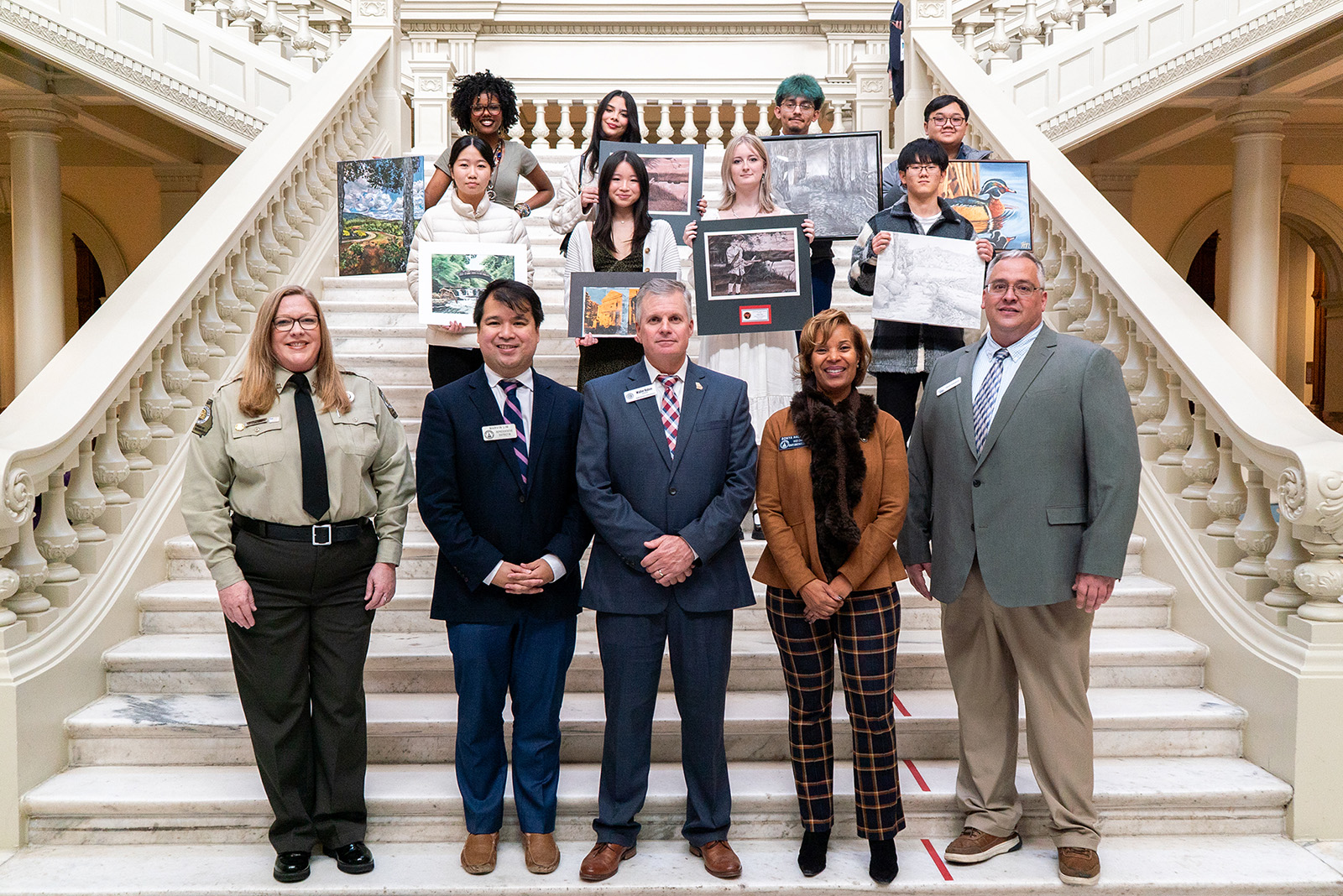 Group photo with contestants, commissioner and other staff